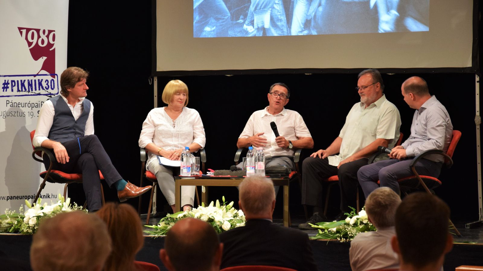 Open-air exhibition and roundtable discussion with the former organizers