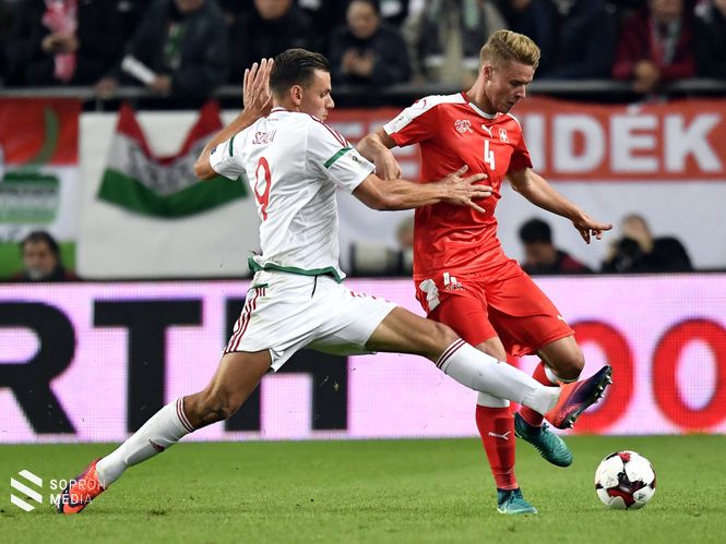 Szalai Ádám  (b) és a svájci Nico Elvedi (j)