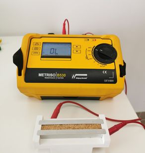 Conductivity of powders