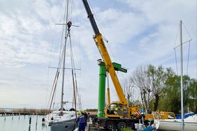 8.5 tonne total weight sail boat set on water using our XCMG crane truck