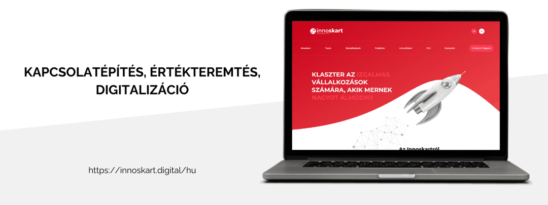 Az Innoskart Digitális Klaszter új weboldala laptopon: piros nyitóoldal rakétával és a „Klaszter az izgalmas vállalkozások számára, akik mernek nagyot álmodni!” felirattal