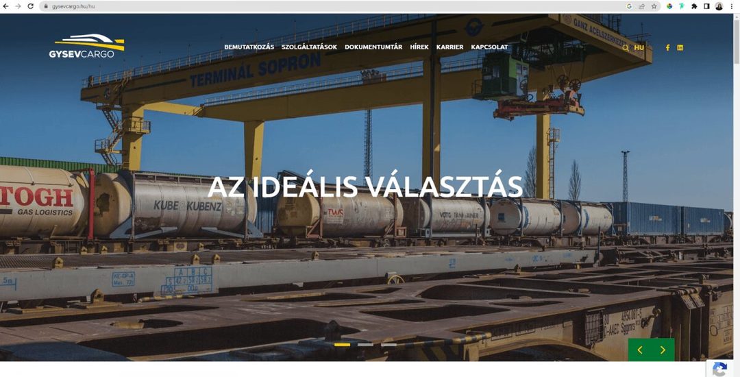 A GYSEV CARGO új weboldalának magyar kezdőlapja: konténerdaru és tartálykocsik a soproni terminálon, „Az ideális választás” felirattal
