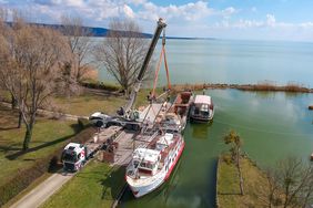 A 55.5 tonne total weight ship lifted out of Lake Balaton using our 220 tonne crane truck